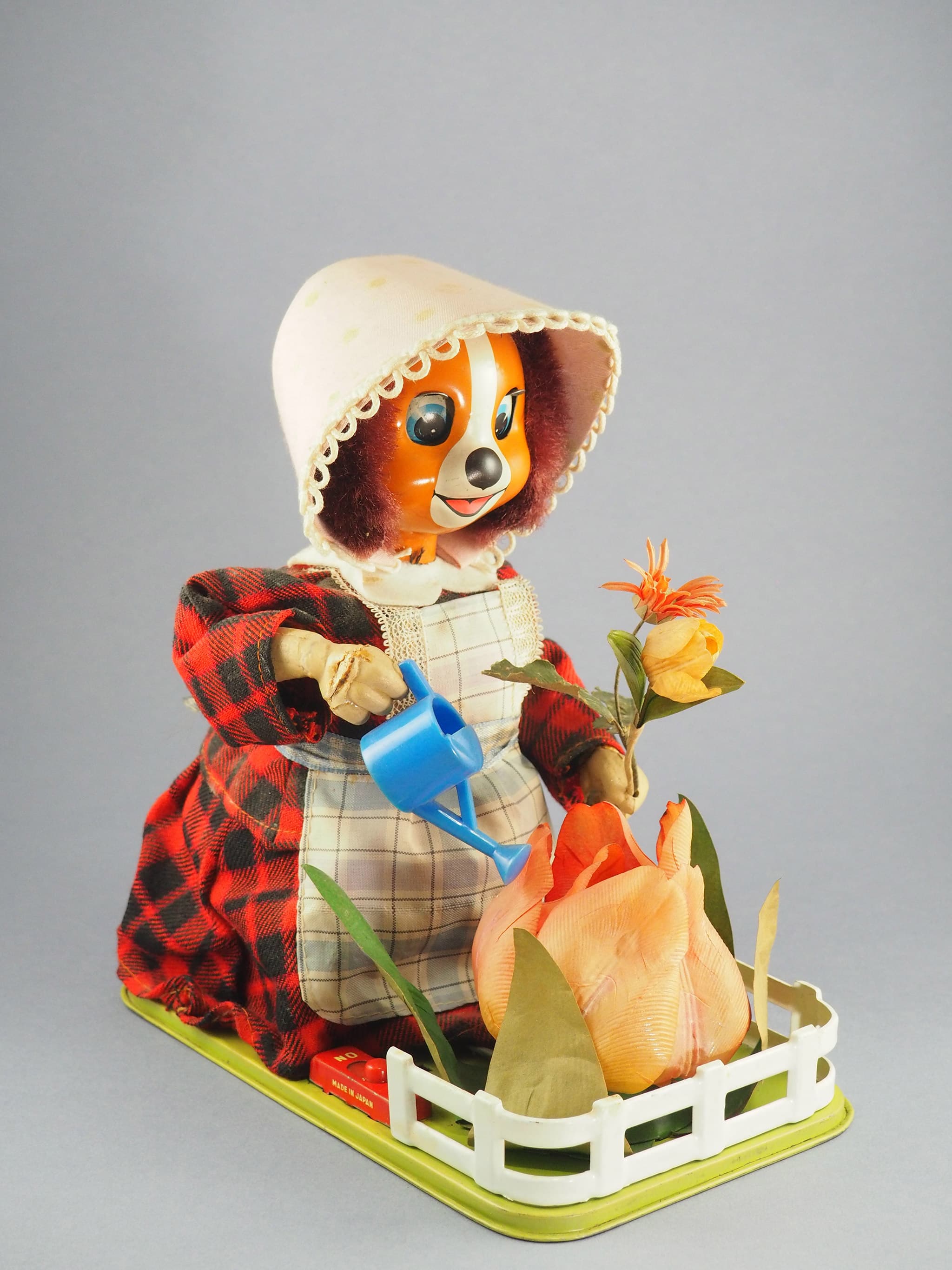 Lady Pup Tending Her Garden
