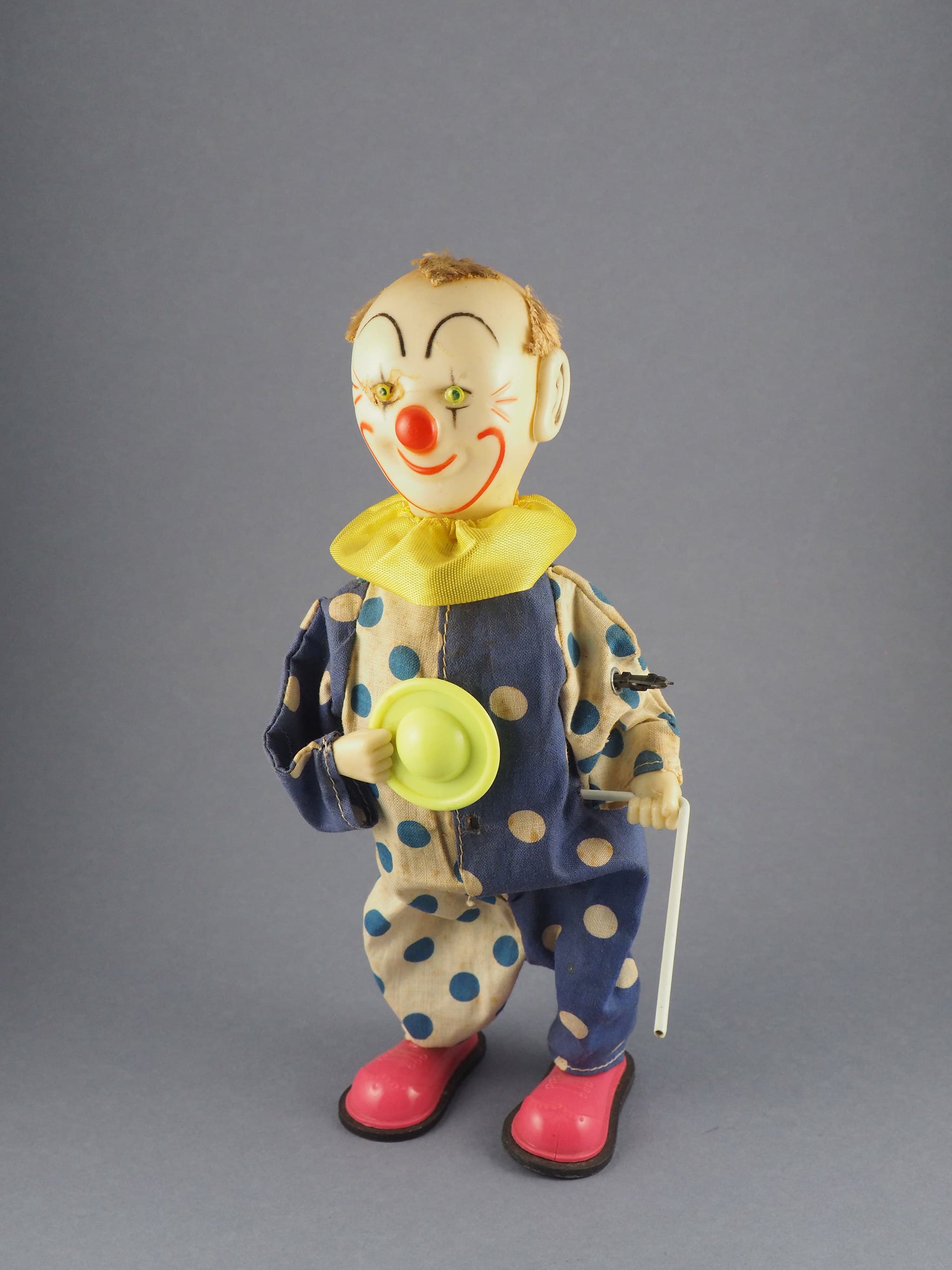 Payaso circo com baston