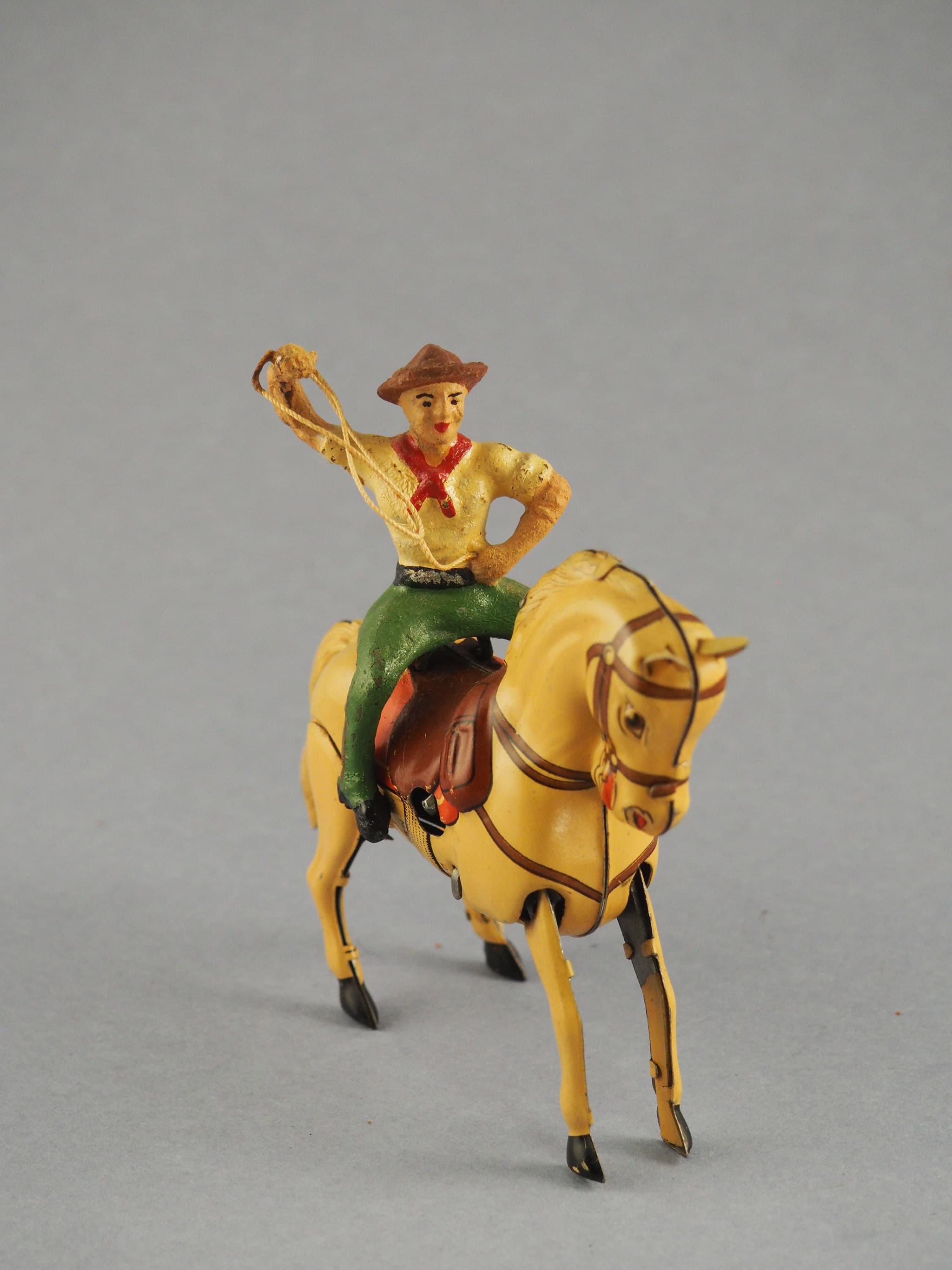 Bucking Horse with Lasso Spinning Rider