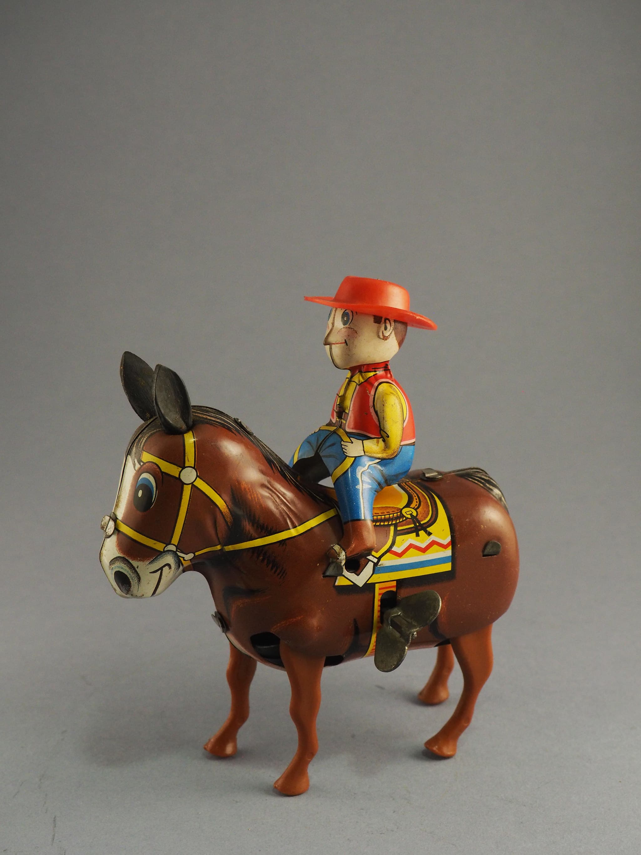 Plodding Donkey with Cowboy