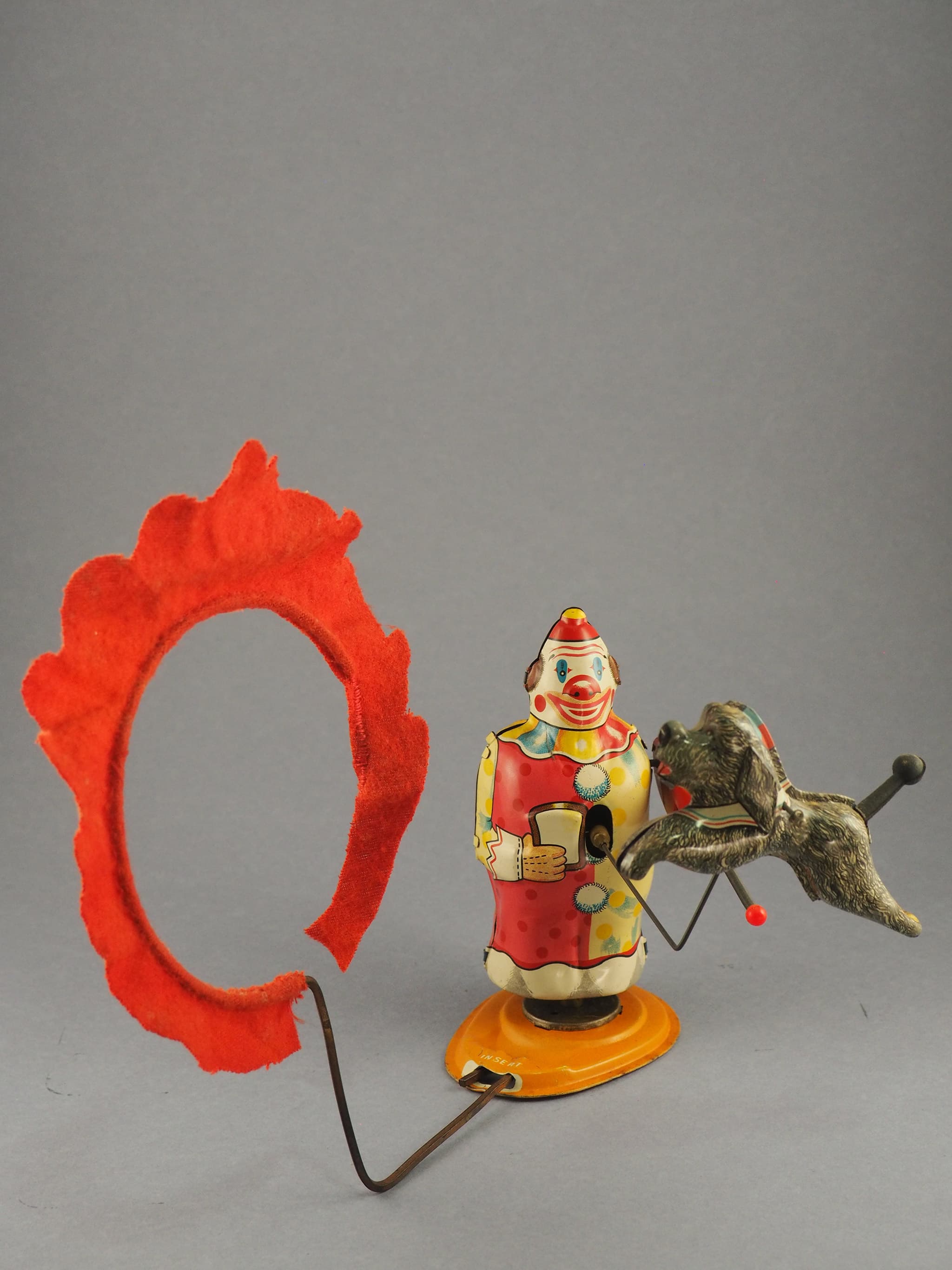 Clown Trainer and His Acrobatic Dog