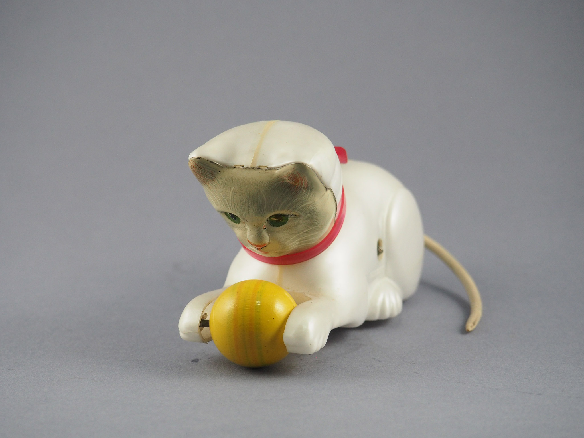Rolling cat with ball photo 2